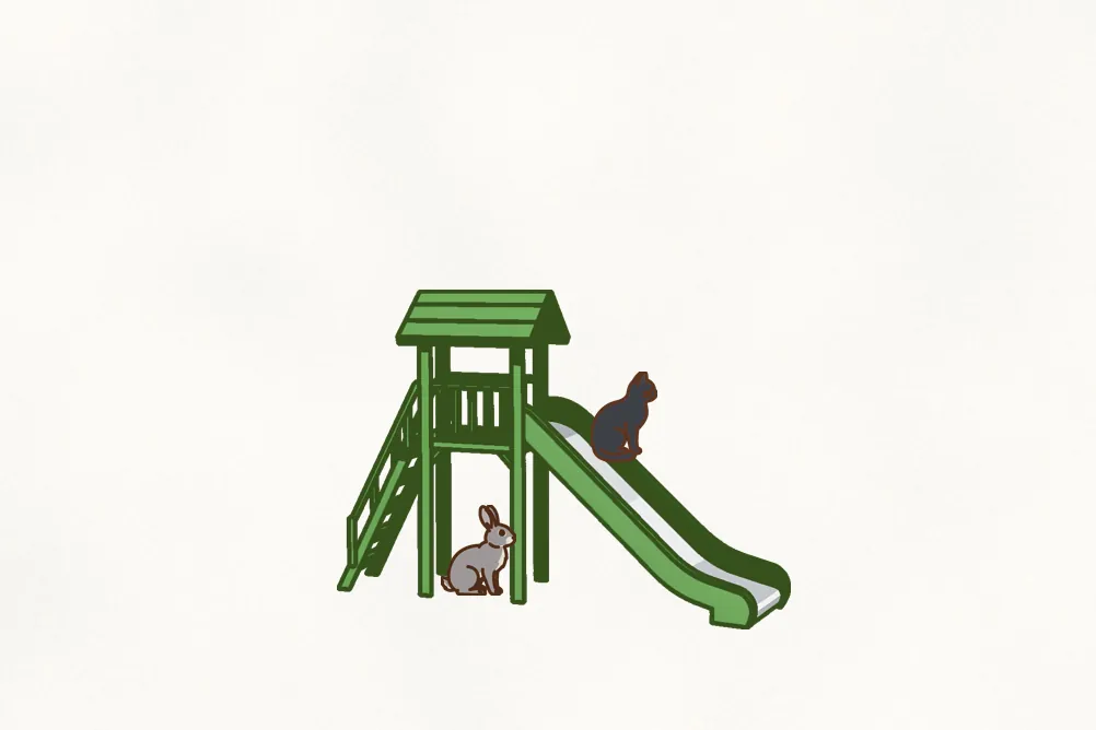 Your picture so far: the cat on the slide and a grey rabbit underneath, still on blank paper